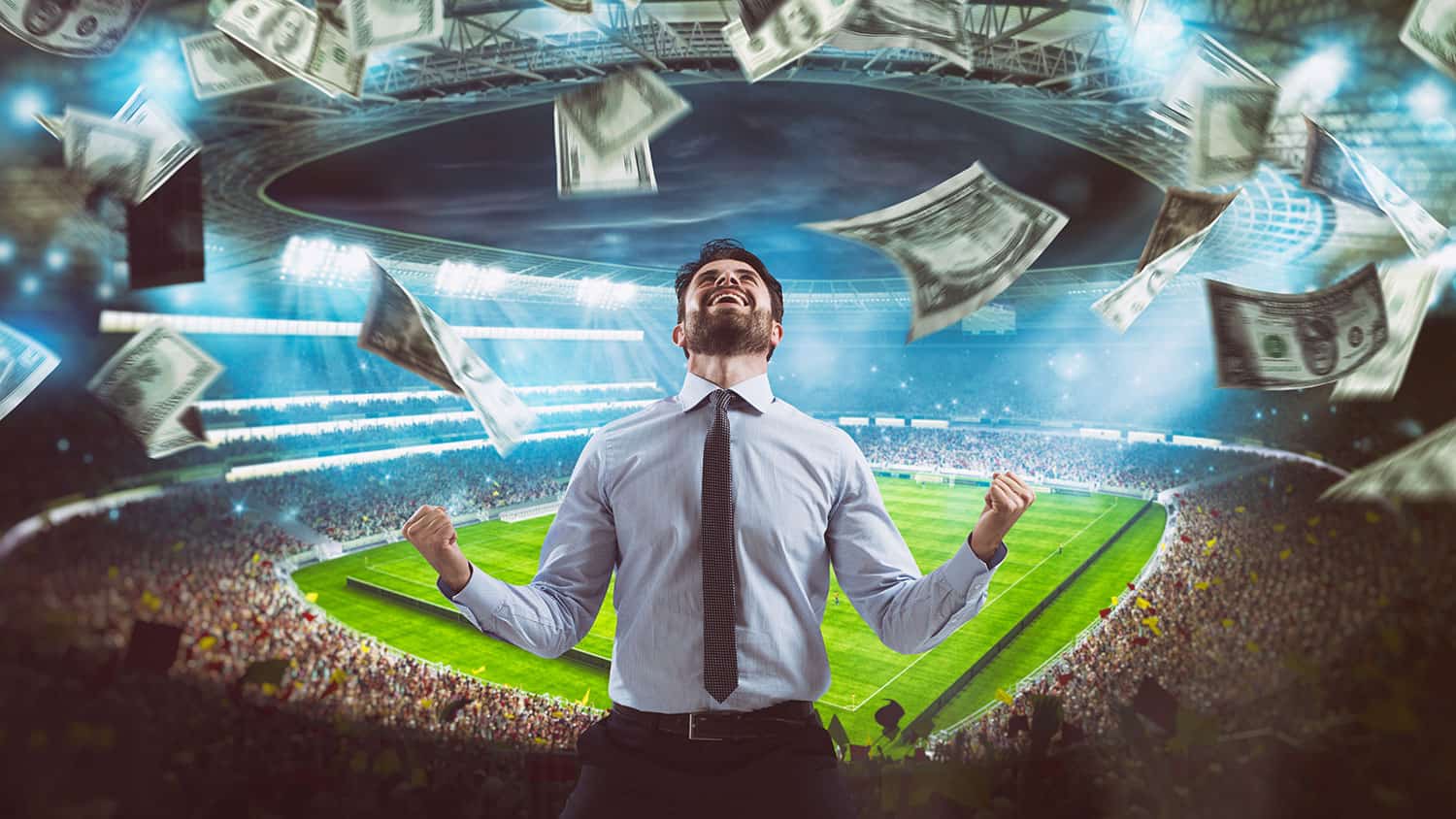 Man who rejoices at the stadium for winning a rich soccer bet